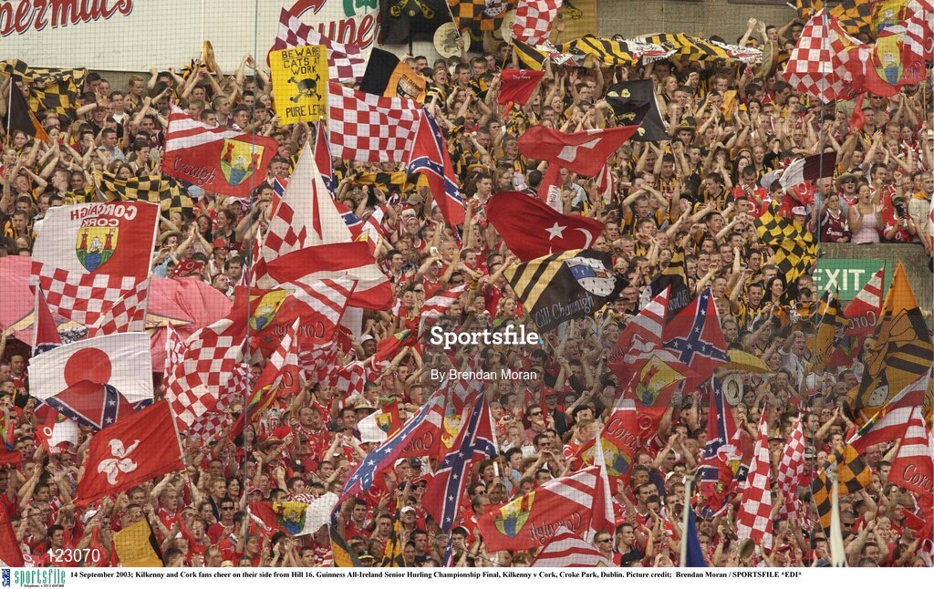 14 September 2003; Kilkenny and Cork fans cheer on their side from Hill 16. Guinness All-Ireland Senior Hurling Championship Final, Kilkenny v Cork, Croke Park, Dublin. Picture credit;  Brendan Moran / SPORTSFILE *EDI*