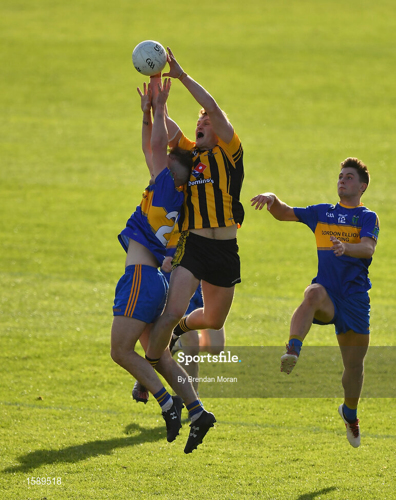 14 October 2018; Ronan Jones of St Peter's Dunboyne in action against Ross Ryan, left, and Cian Devlin of Summerhill during the Meath County Senior Club Football Championship Final match between St Peter's Dunboyne and Summerhill at Páirc Tailteann in Navan, Meath. Photo by Brendan Moran/Sportsfile
