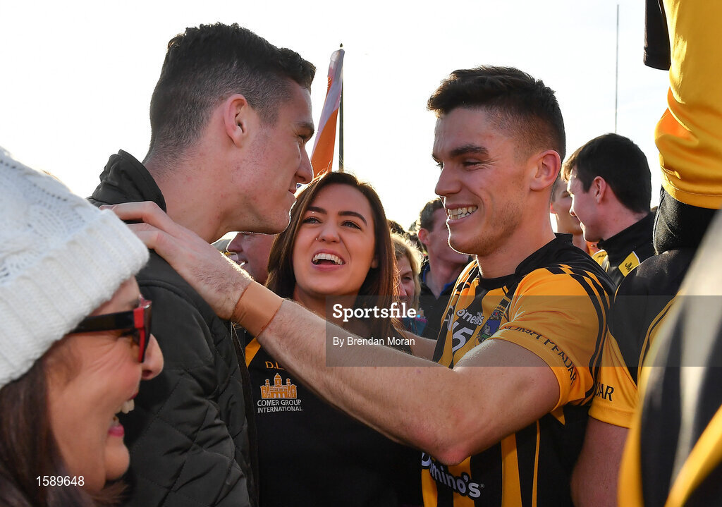 14 October 2018; Donal Lenihan, right, of St Peter's Dunboyne celebrates with his brother, and Republic of Ireland international Darragh Lenihan and family after the Meath County Senior Club Football Championship Final match between St Peter's Dunboyne and Summerhill at Páirc Tailteann in Navan, Meath. Photo by Brendan Moran/Sportsfile