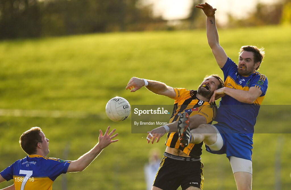 14 October 2018; David Gallagher of St Peter's Dunboyne contests a kickout with Padraig Geraghty, left, and Michael Byrne of Summerhill during the Meath County Senior Club Football Championship Final match between St Peter's Dunboyne and Summerhill at Páirc Tailteann in Navan, Meath. Photo by Brendan Moran/Sportsfile