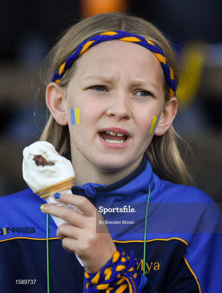14 October 2018; A young Summerhill supporter enjoys a '99' ice cream cone during the Meath County Senior Club Football Championship Final match between St Peter's Dunboyne and Summerhill at Páirc Tailteann in Navan, Meath. Photo by Brendan Moran/Sportsfile