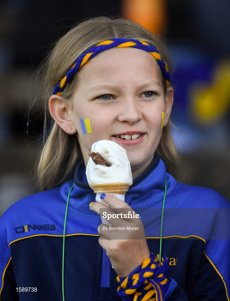 14 October 2018; A young Summerhill supporter enjoys a '99' ice cream cone during the Meath County Senior Club Football Championship Final match between St Peter's Dunboyne and Summerhill at Páirc Tailteann in Navan, Meath. Photo by Brendan Moran/Sportsfile
