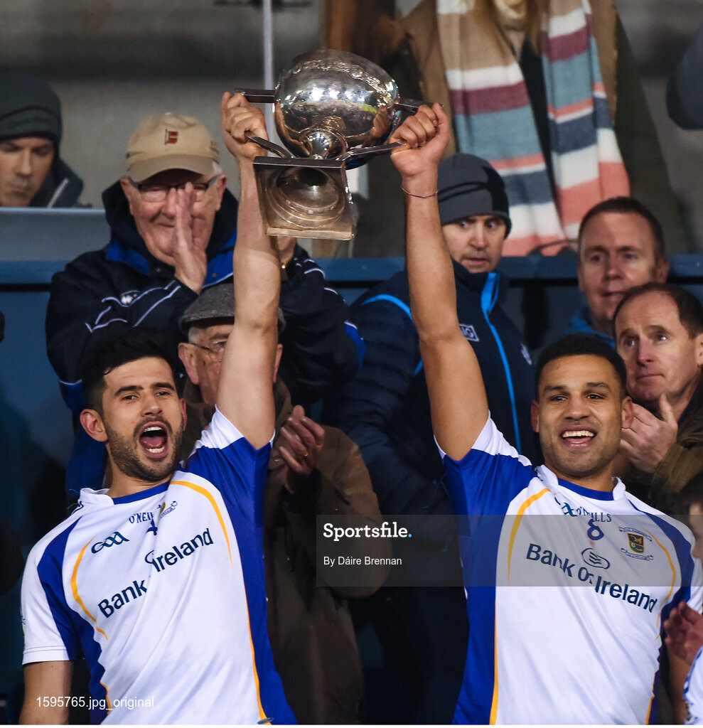 29 October 2018; Kilmacud Crokes joint captains Cian O'Sullivan, left, and Craig Dias lift the cup after the Dublin County Senior Club Football Championship Final match between St Jude's and Kilmacud Crokes at Parnell Park in Dublin. Photo by Daire Brennan/Sportsfile
