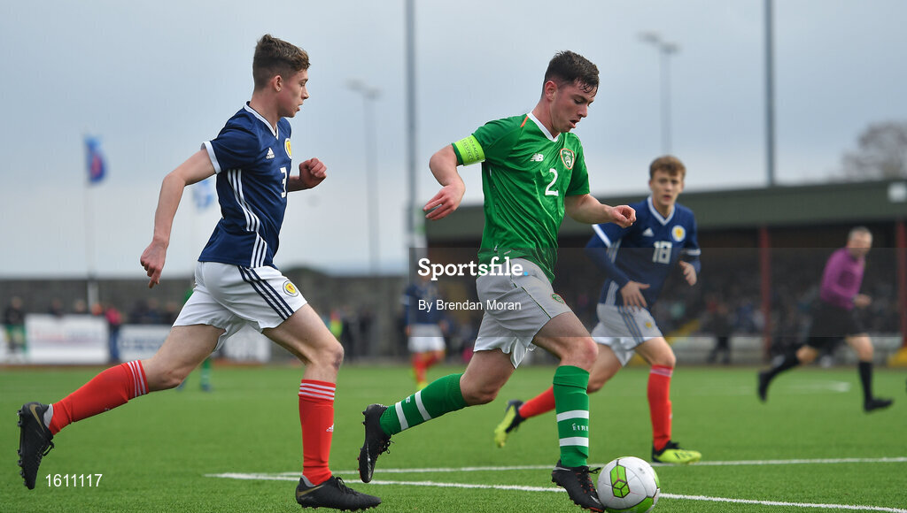 16 November 2018; Gavin O'Brien of Republic of Ireland in action against Lyall Booth of Scotland during the U16 Victory Shield match between Republic of Ireland and Scotland at Mounthawk Park in Tralee, Kerry. Photo by Brendan Moran/Sportsfile