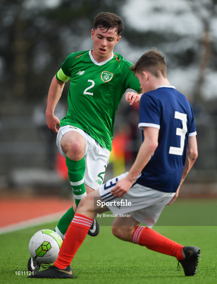 16 November 2018; Gavin O'Brien of Republic of Ireland in action against Lyall Booth of Scotland during the U16 Victory Shield match between Republic of Ireland and Scotland at Mounthawk Park in Tralee, Kerry. Photo by Brendan Moran/Sportsfile