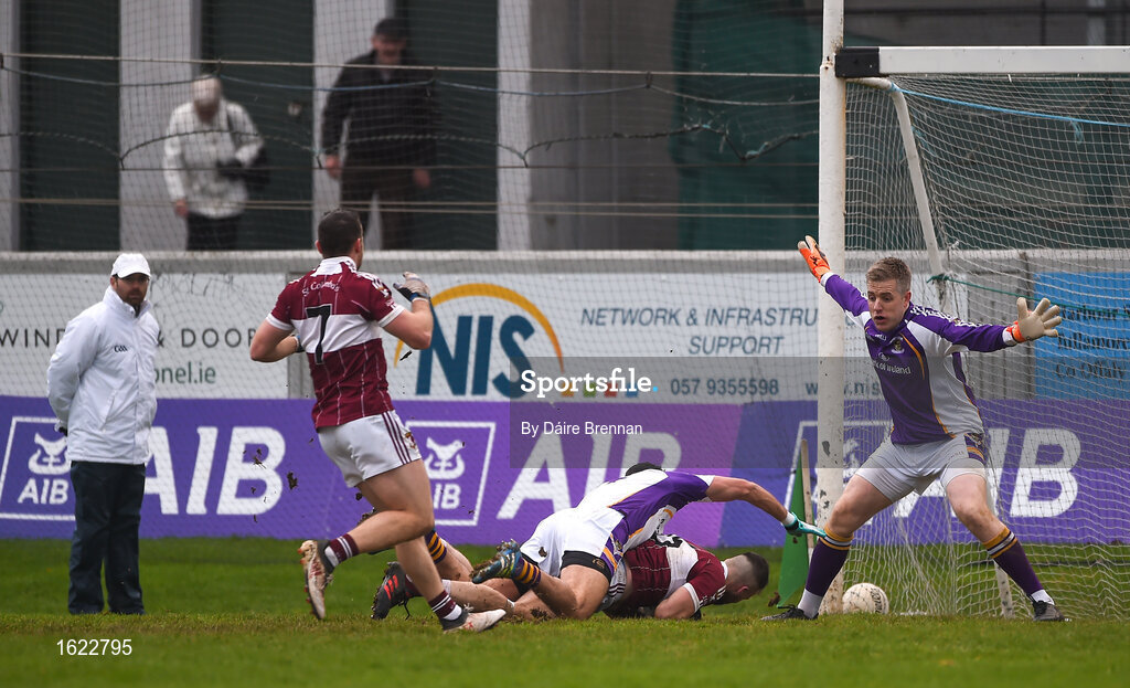 9 December 2018; Aidan McElligott of Mullinalaghta St Columba's is fouled by Cian O'Sullivan of Kilmacud Crokes which resulted in a penalty during the AIB Leinster GAA Football Senior Club Championship Final match between Kilmacud Crokes and Mullinalaghta St Columba's at Bord na Móna O'Connor Park in Offaly. Photo by Daire Brennan/Sportsfile