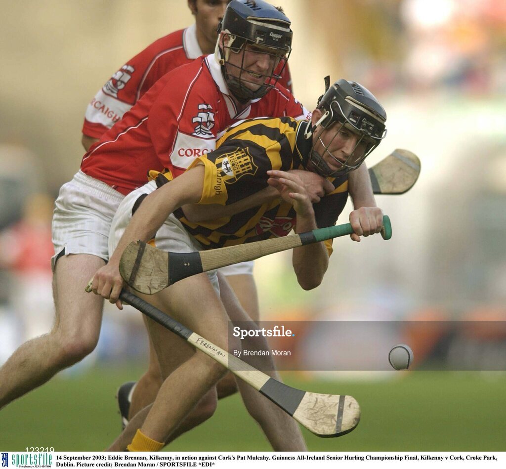 14 September 2003; Eddie Brennan, Kilkenny, in action against Cork's Pat Mulcahy. Guinness All-Ireland Senior Hurling Championship Final, Kilkenny v Cork, Croke Park, Dublin. Picture credit; Brendan Moran / SPORTSFILE *EDI*
