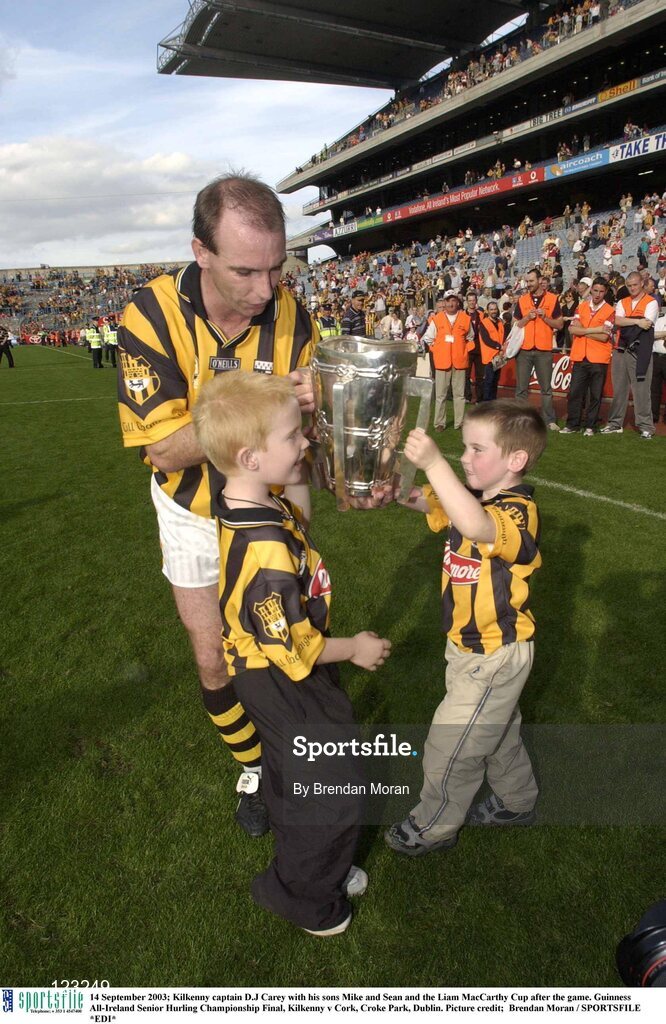 14 September 2003; Kilkenny captain D.J Carey with his sons Mike and Sean and the Liam MacCarthy Cup after the game. Guinness All-Ireland Senior Hurling Championship Final, Kilkenny v Cork, Croke Park, Dublin. Picture credit;  Brendan Moran / SPORTSFILE *EDI*