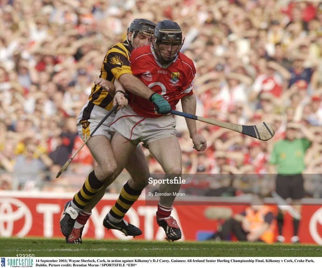 14 September 2003; Wayne Sherlock, Cork, in action against Kilkenny's D.J Carey. Guinness All-Ireland Senior Hurling Championship Final, Kilkenny v Cork, Croke Park, Dublin. Picture credit; Brendan Moran / SPORTSFILE *EDI*