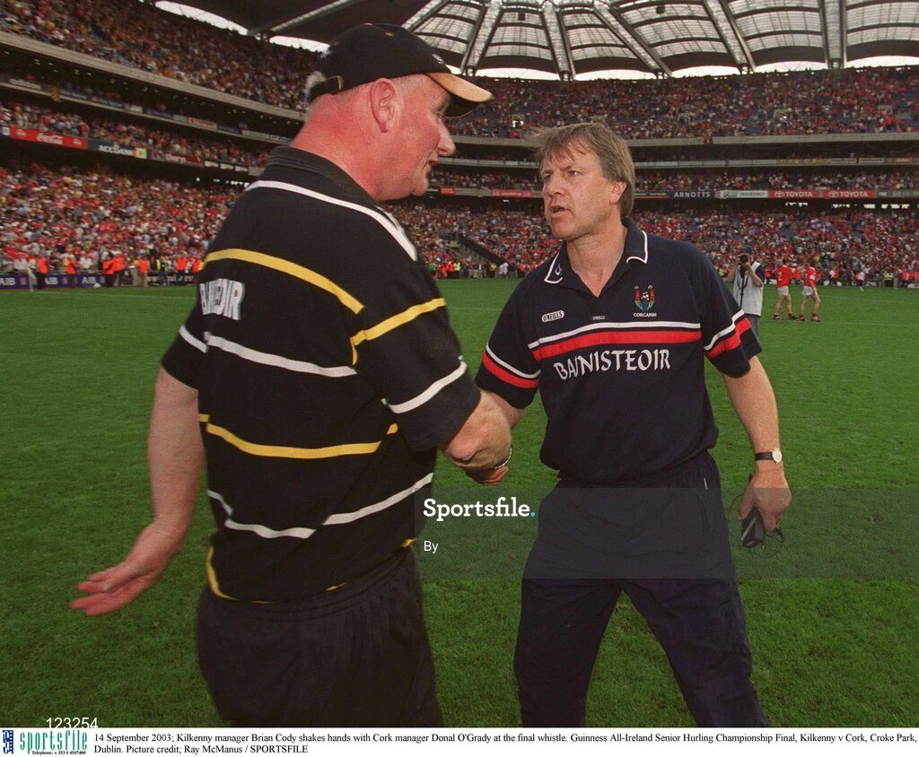 14 September 2003; Kilkenny manager Brian Cody shakes hands with Cork manager Donal O'Grady at the final whistle. Guinness All-Ireland Senior Hurling Championship Final, Kilkenny v Cork, Croke Park, Dublin. Picture credit; Ray McManus / SPORTSFILE