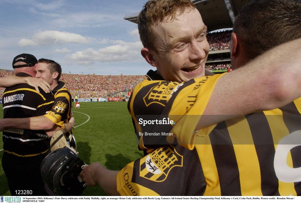14 September 2003; Kilkenny's Peter Barry celebrates with Paddy Mullally, right, as manager Brian Cody celebrates with Derek Lyng. Guinness All-Ireland Senior Hurling Championship Final, Kilkenny v Cork, Croke Park, Dublin. Picture credit;  Brendan Moran / SPORTSFILE *EDI*