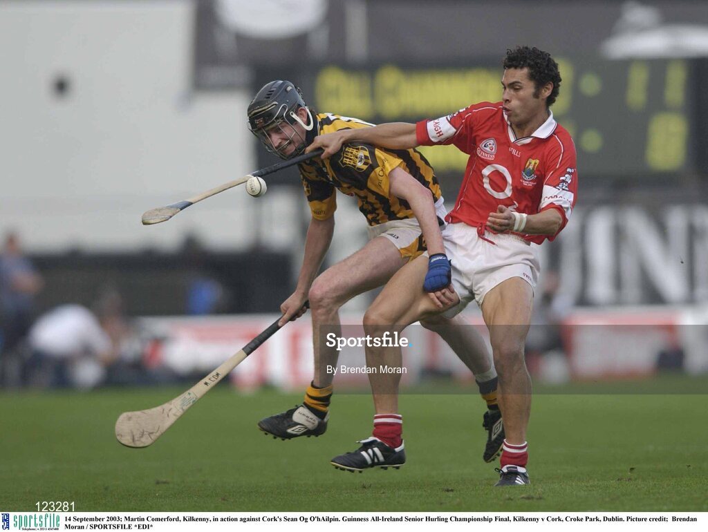 14 September 2003; Martin Comerford, Kilkenny, in action against Cork's Sean Og O'hAilpin. Guinness All-Ireland Senior Hurling Championship Final, Kilkenny v Cork, Croke Park, Dublin. Picture credit;  Brendan Moran / SPORTSFILE *EDI*