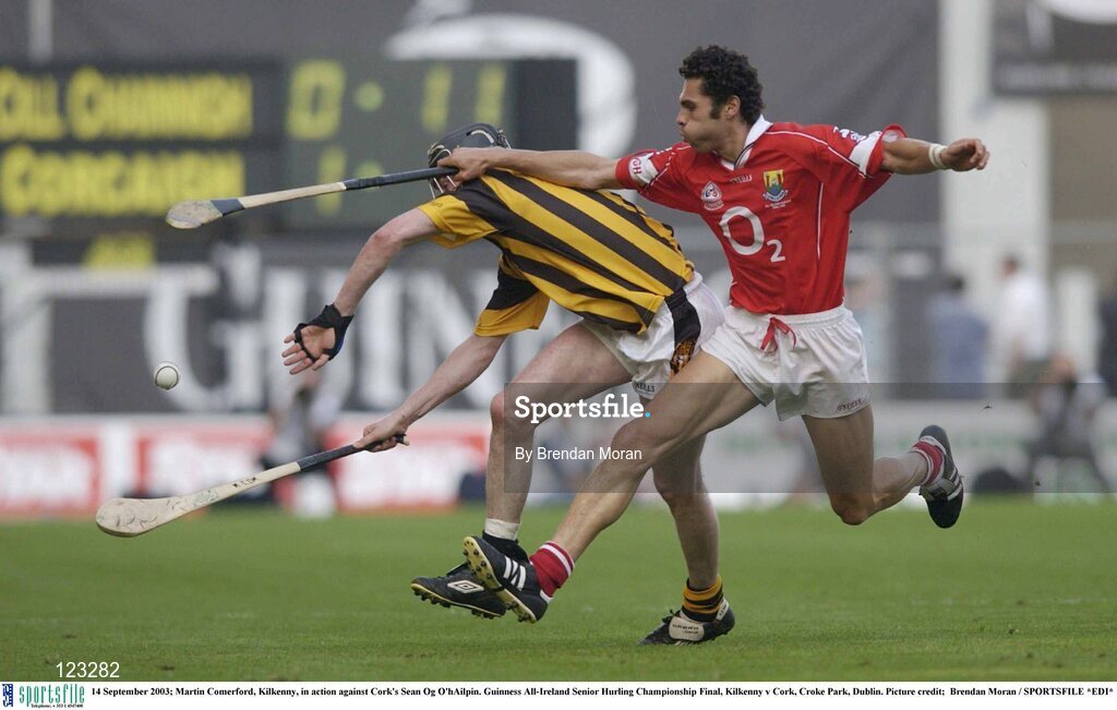 14 September 2003; Martin Comerford, Kilkenny, in action against Cork's Sean Og O'hAilpin. Guinness All-Ireland Senior Hurling Championship Final, Kilkenny v Cork, Croke Park, Dublin. Picture credit;  Brendan Moran / SPORTSFILE *EDI*