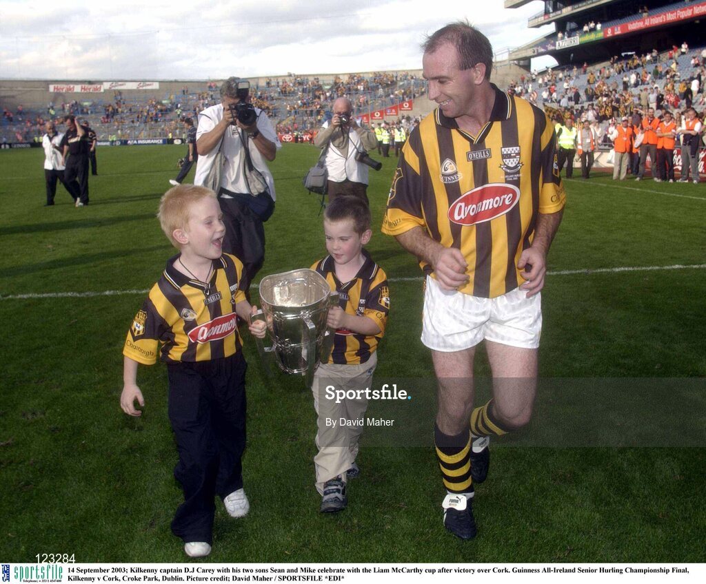 14 September 2003; Kilkenny captain DJ Carey with his two sons Sean and Mike celebrate with the Liam MacCarthy cup after victory over Cork. Guinness All-Ireland Senior Hurling Championship Final, Kilkenny v Cork, Croke Park, Dublin. Picture credit; David Maher / SPORTSFILE *EDI*