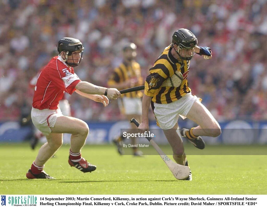 14 September 2003; Martin Comerford, Kilkenny, in action against Cork's Wayne Sherlock. Guinness All-Ireland Senior Hurling Championship Final, Kilkenny v Cork, Croke Park, Dublin. Picture credit; David Maher / SPORTSFILE *EDI*
