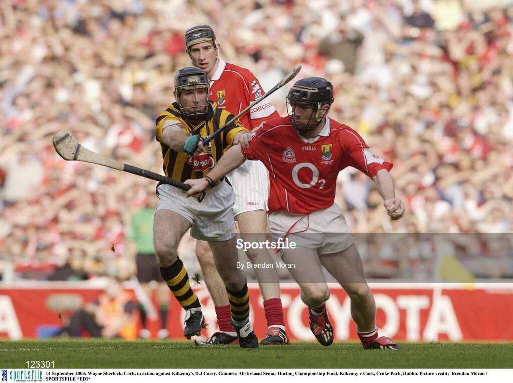 14 September 2003; Wayne Sherlock, Cork, in action against Kilkenny's D.J Carey. Guinness All-Ireland Senior Hurling Championship Final, Kilkenny v Cork, Croke Park, Dublin. Picture credit;  Brendan Moran / SPORTSFILE *EDI*