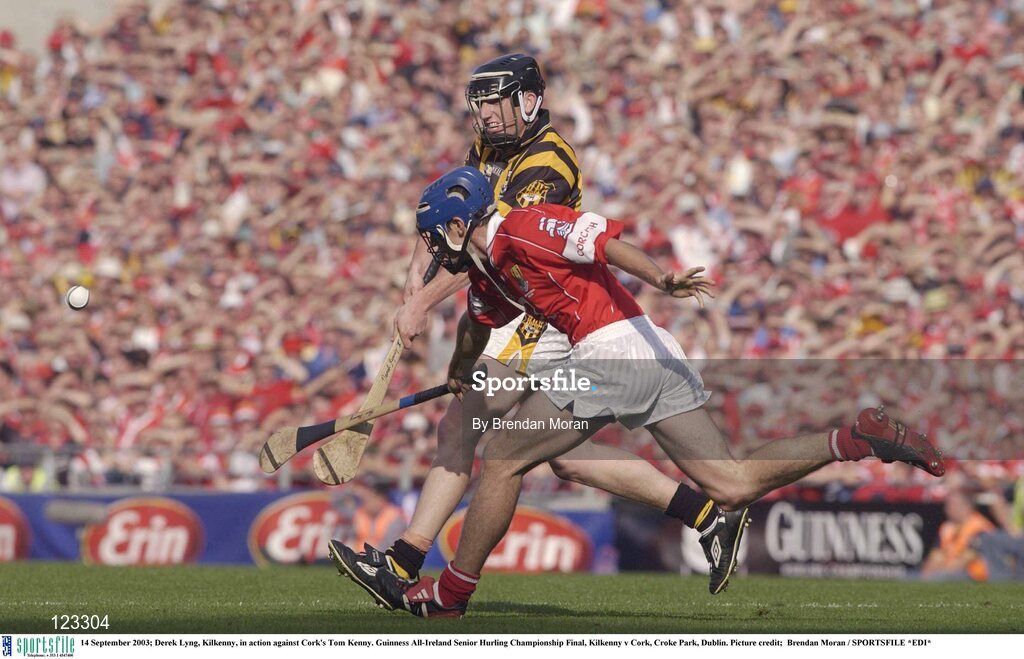 14 September 2003; Derek Lyng, Kilkenny, in action against Cork's Tom Kenny. Guinness All-Ireland Senior Hurling Championship Final, Kilkenny v Cork, Croke Park, Dublin. Picture credit;  Brendan Moran / SPORTSFILE *EDI*