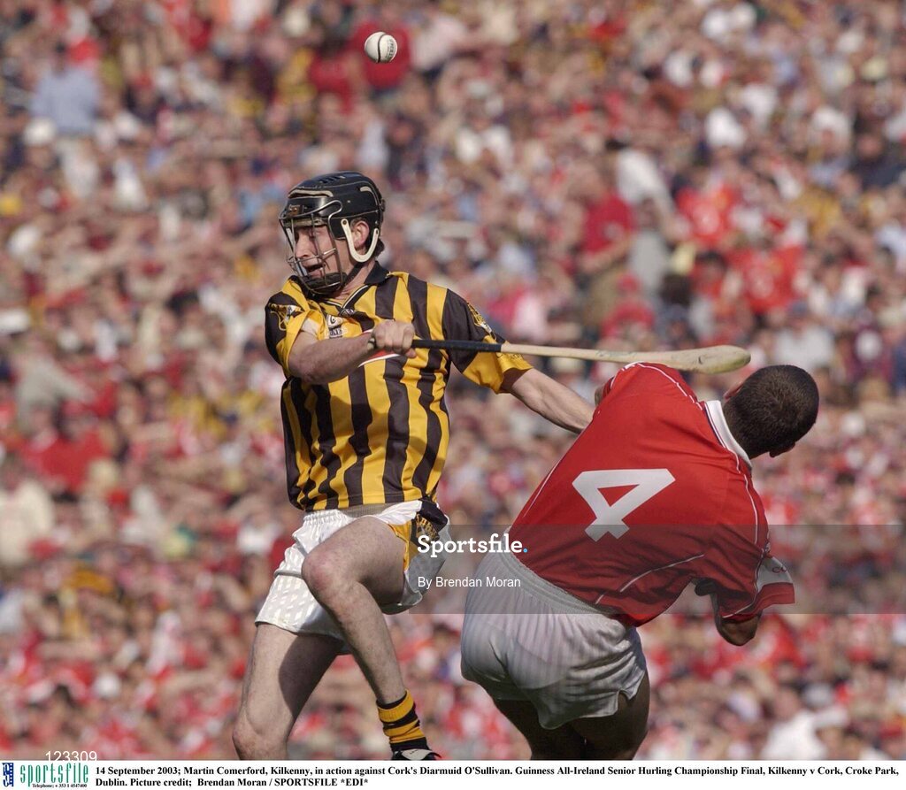 14 September 2003; Martin Comerford, Kilkenny, in action against Cork's Diarmuid O'Sullivan. Guinness All-Ireland Senior Hurling Championship Final, Kilkenny v Cork, Croke Park, Dublin. Picture credit;  Brendan Moran / SPORTSFILE *EDI*