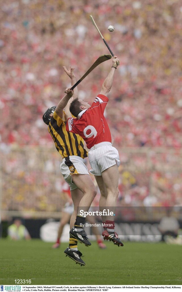 14 September 2003; Michael O'Connell, Cork, in action against Kilkenny's Derek Lyng. Guinness All-Ireland Senior Hurling Championship Final, Kilkenny v Cork, Croke Park, Dublin. Picture credit;  Brendan Moran / SPORTSFILE *EDI*