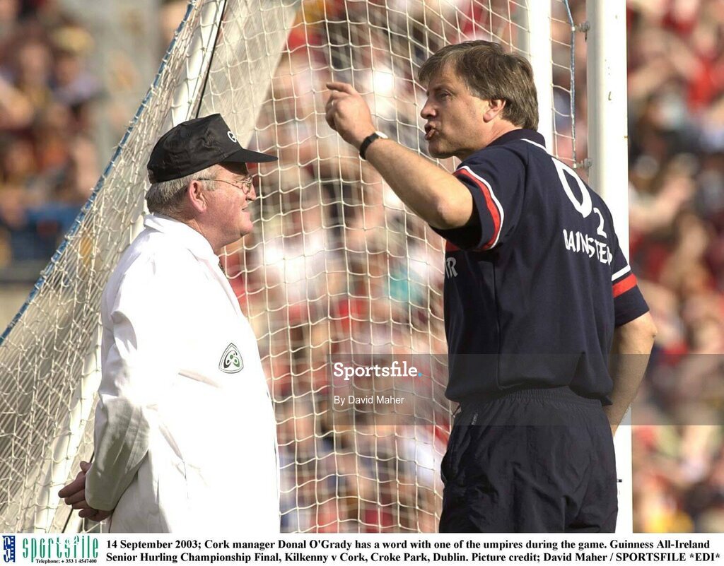 14 September 2003; Cork manager Donal O'Grady has a word with one of the umpires during the game. Guinness All-Ireland Senior Hurling Championship Final, Kilkenny v Cork, Croke Park, Dublin. Picture credit; David Maher / SPORTSFILE *EDI*