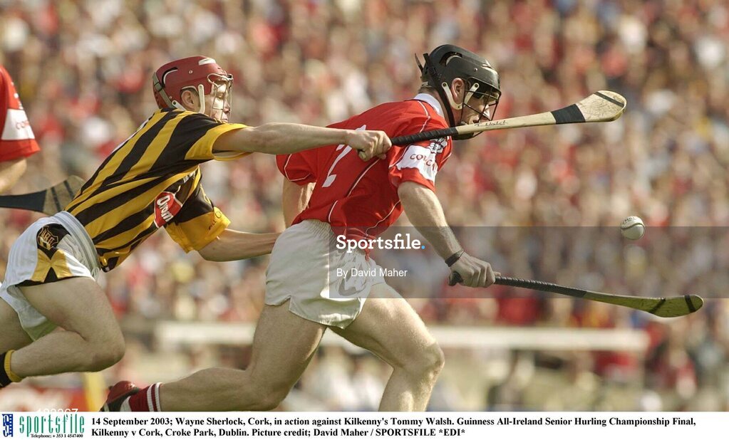 14 September 2003; Wayne Sherlock, Cork, in action against Kilkenny's Tommy Walsh. Guinness All-Ireland Senior Hurling Championship Final, Kilkenny v Cork, Croke Park, Dublin. Picture credit; David Maher / SPORTSFILE *EDI*