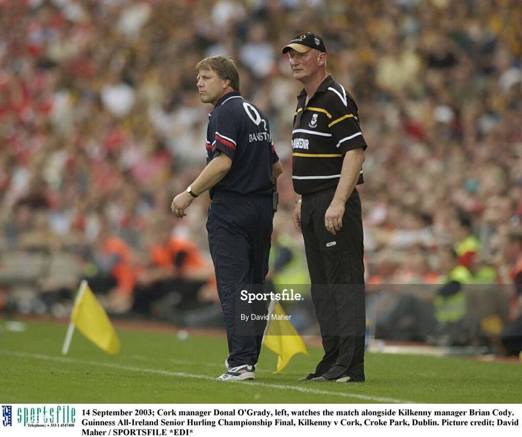 14 September 2003; Cork manager Donal O'Grady, left, watches the match alongside Kilkenny manager Brian Cody. Guinness All-Ireland Senior Hurling Championship Final, Kilkenny v Cork, Croke Park, Dublin. Picture credit; David Maher / SPORTSFILE *EDI*