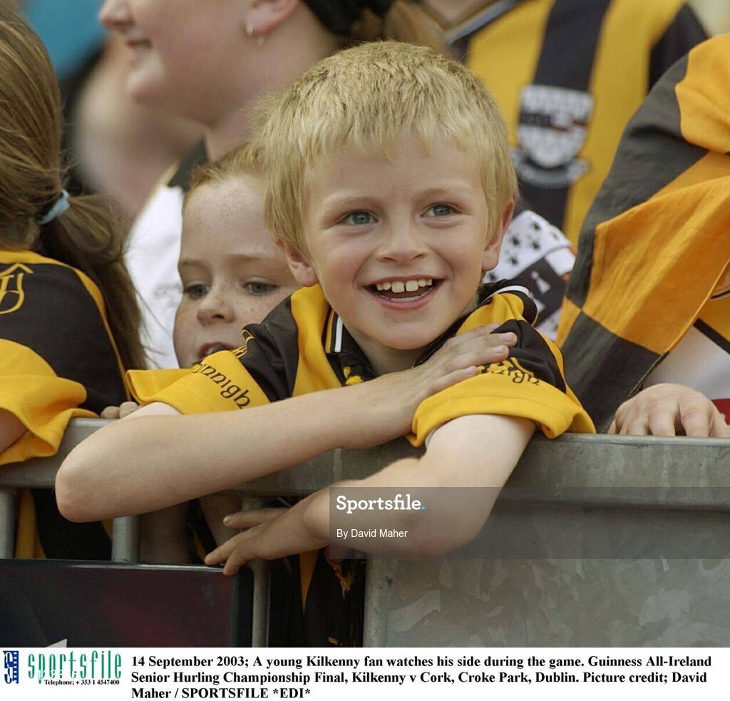 14 September 2003; A young Kilkenny fan watches his side during the game. Guinness All-Ireland Senior Hurling Championship Final, Kilkenny v Cork, Croke Park, Dublin. Picture credit; David Maher / SPORTSFILE *EDI*
