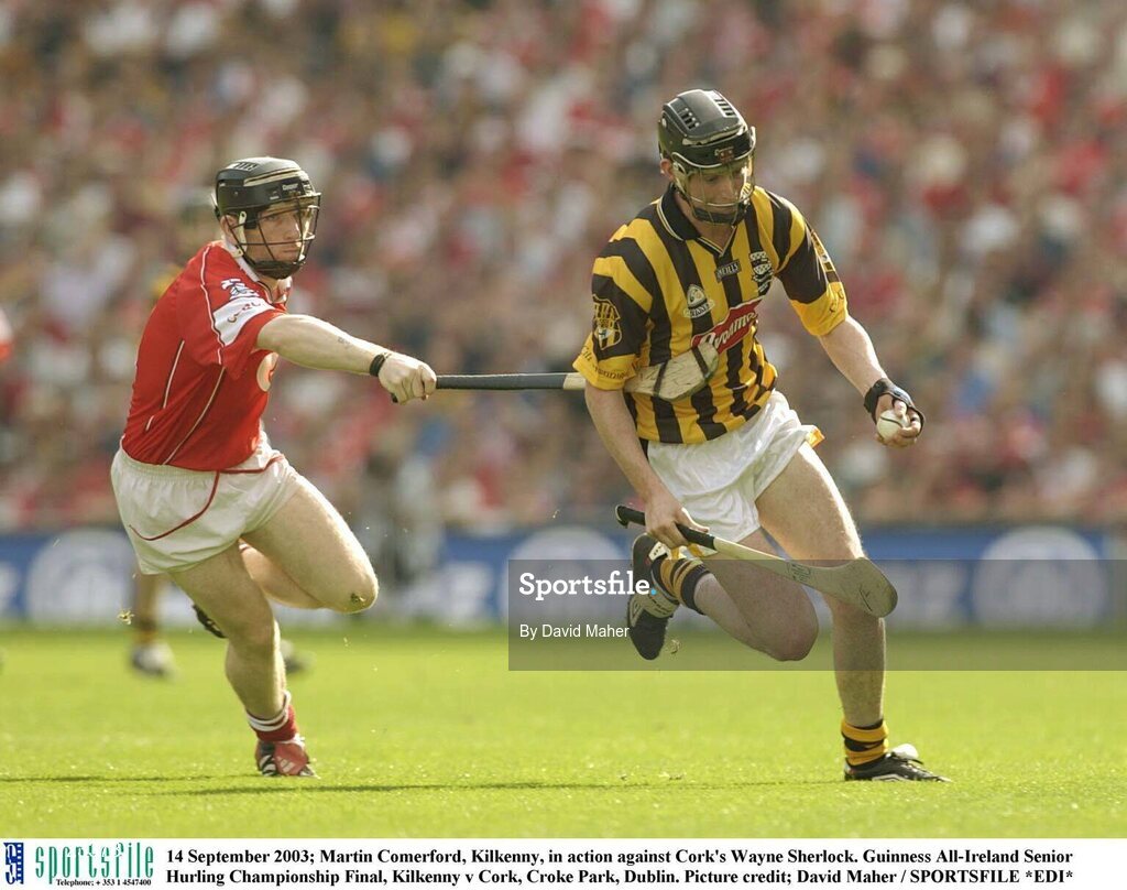 14 September 2003; Martin Comerford, Kilkenny, in action against Cork's Wayne Sherlock. Guinness All-Ireland Senior Hurling Championship Final, Kilkenny v Cork, Croke Park, Dublin. Picture credit; David Maher / SPORTSFILE *EDI*