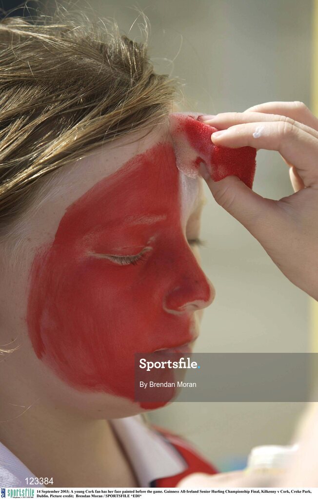 14 September 2003; A young Cork fan has her face painted before the game. Guinness All-Ireland Senior Hurling Championship Final, Kilkenny v Cork, Croke Park, Dublin. Picture credit;  Brendan Moran / SPORTSFILE *EDI*