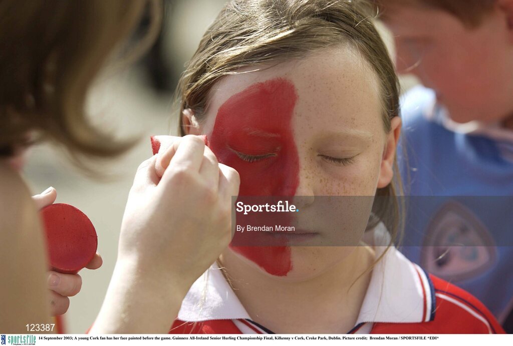 14 September 2003; A young Cork fan has her face painted before the game. Guinness All-Ireland Senior Hurling Championship Final, Kilkenny v Cork, Croke Park, Dublin. Picture credit;  Brendan Moran / SPORTSFILE *EDI*