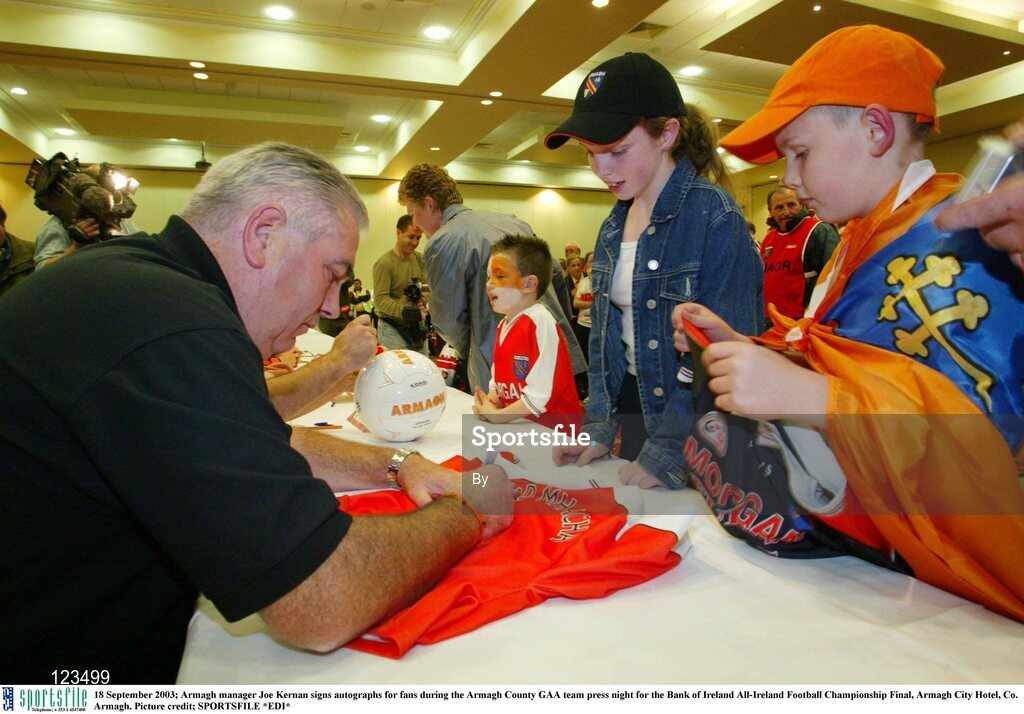 18 September 2003; Armagh manager Joe Kernan signs autographs for fans during the Armagh County GAA team press night for the Bank of Ireland All-Ireland Football Championship Final, Armagh City Hotel, Co. Armagh. Picture credit; SPORTSFILE *EDI*