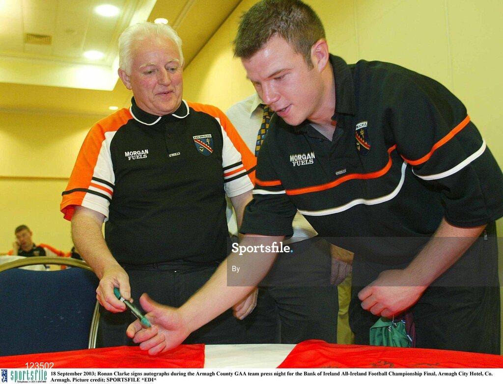 18 September 2003; Ronan Clarke signs autographs during the Armagh County GAA team press night for the Bank of Ireland All-Ireland Football Championship Final, Armagh City Hotel, Co. Armagh. Picture credit; SPORTSFILE *EDI*