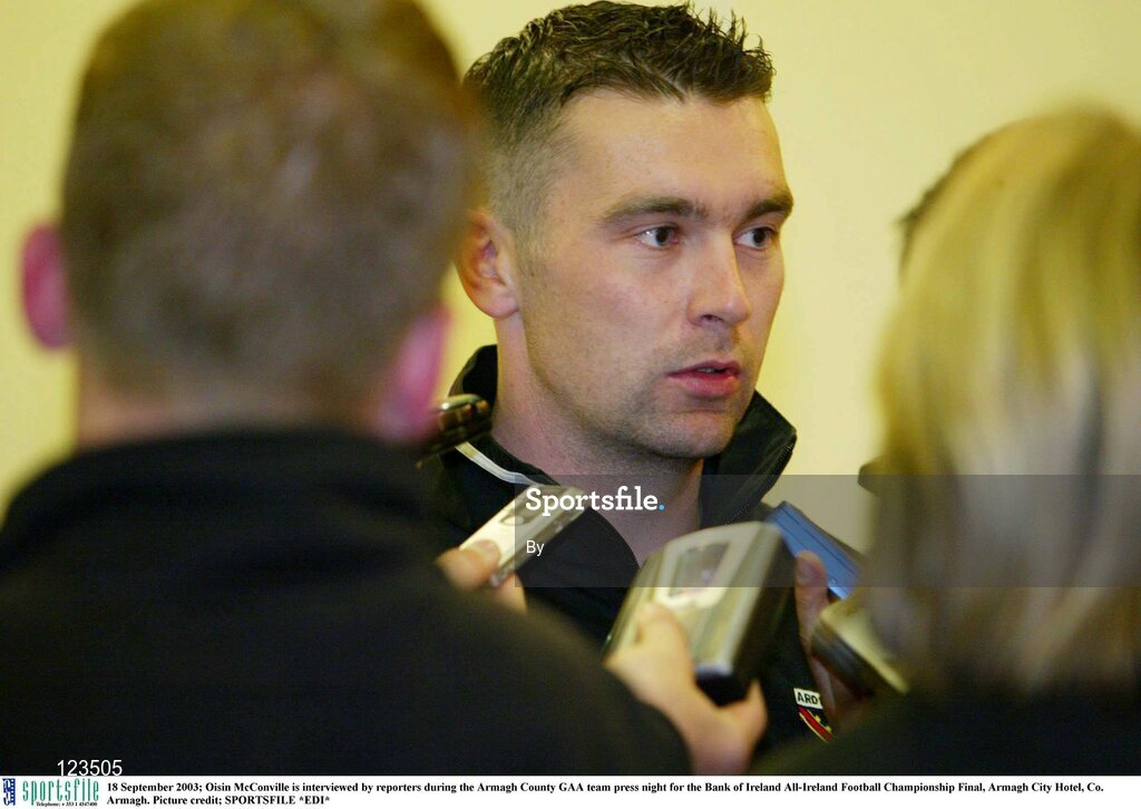 18 September 2003; Oisin McConville is interviewed by reporters during the Armagh County GAA team press night for the Bank of Ireland All-Ireland Football Championship Final, Armagh City Hotel, Co. Armagh. Picture credit; SPORTSFILE *EDI*