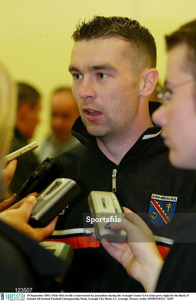 18 September 2003; Oisin McConville is interviewed by journalists during the Armagh County GAA team press night for the Bank of Ireland All-Ireland Football Championship Final, Armagh City Hotel, Co. Armagh. Picture credit; SPORTSFILE *EDI*