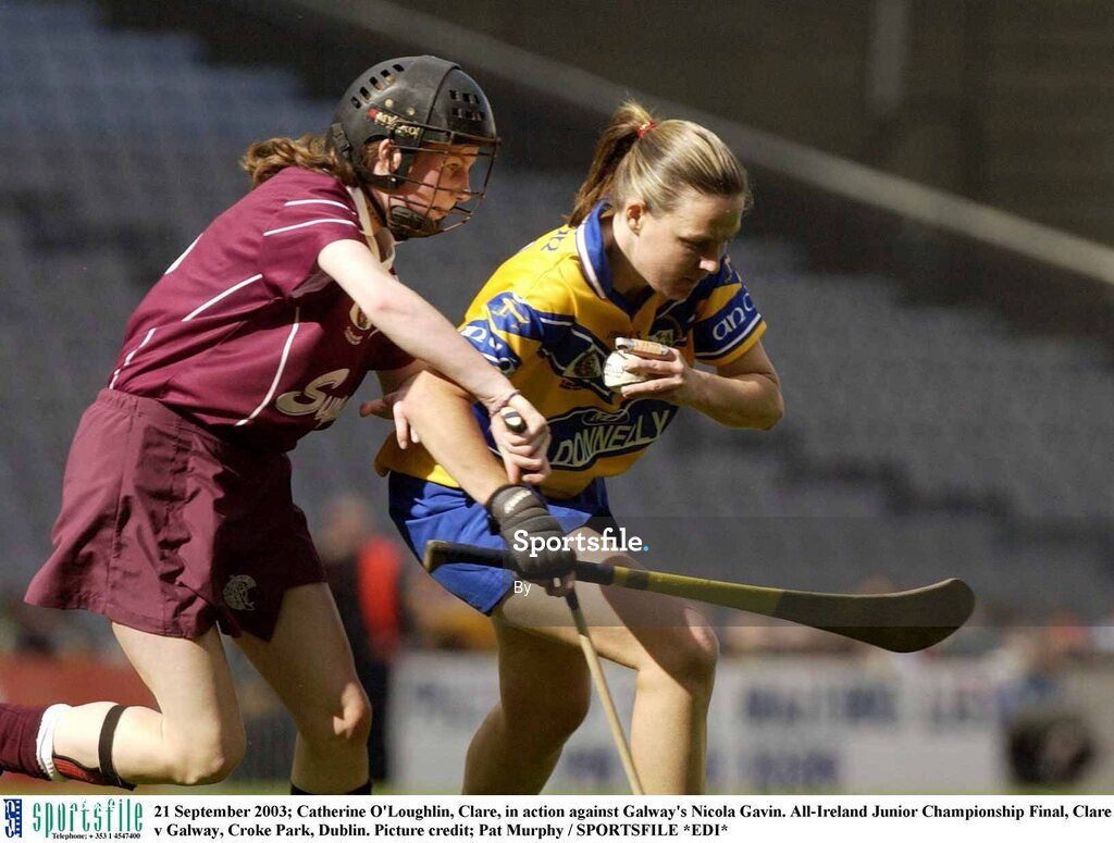 21 September 2003; Catherine O'Loughlin, Clare, in action against Galway's Nicola Gavin. All-Ireland Junior Championship Final, Clare v Galway, Croke Park, Dublin. Picture credit; Pat Murphy / SPORTSFILE *EDI*