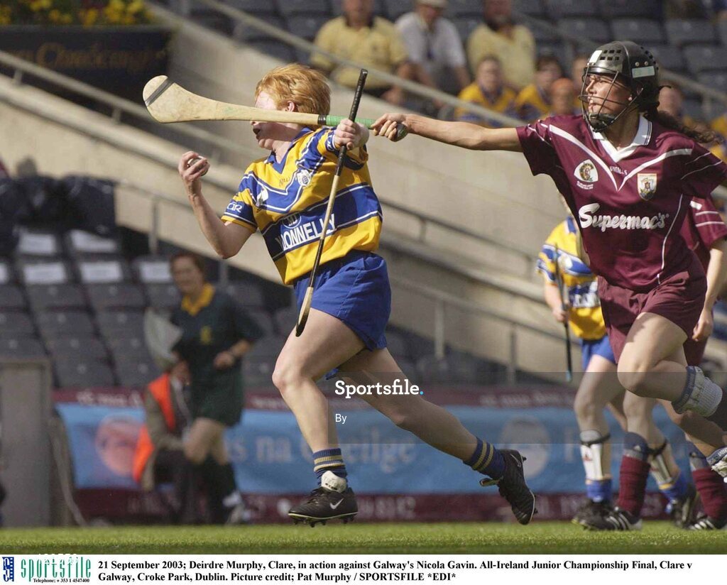 21 September 2003; Deirdre Murphy, Clare, in action against Galway's Nicola Gavin. All-Ireland Junior Championship Final, Clare v Galway, Croke Park, Dublin. Picture credit; Pat Murphy / SPORTSFILE *EDI*
