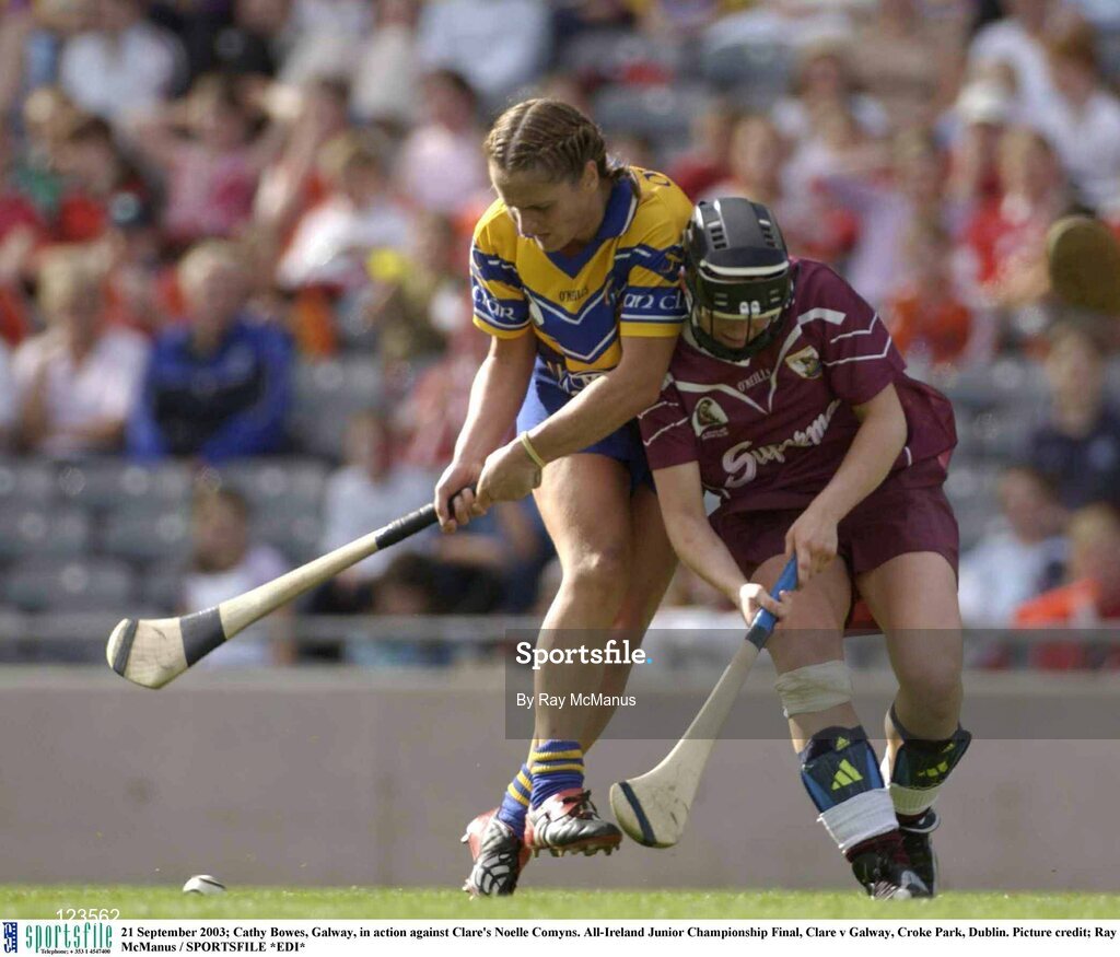 21 September 2003; Cathy Bowes, Galway, in action against Clare's Noelle Comyns. All-Ireland Junior Championship Final, Clare v Galway, Croke Park, Dublin. Picture credit; Ray McManus / SPORTSFILE *EDI*