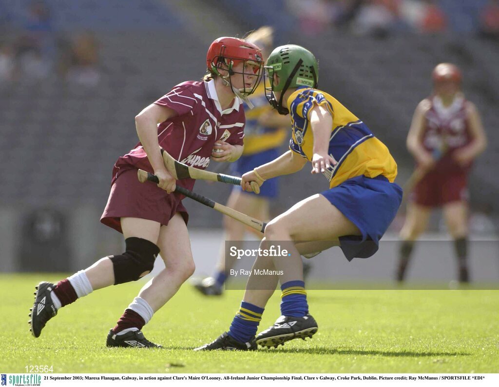 21 September 2003; Maresa Flanagan, Galway, in action against Clare's Maire O'Looney. All-Ireland Junior Championship Final, Clare v Galway, Croke Park, Dublin. Picture credit; Ray McManus / SPORTSFILE *EDI*