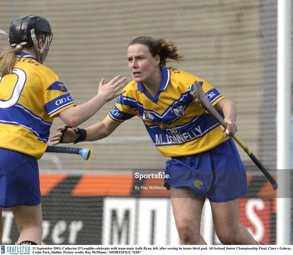 21 September 2003; Catherine O'Loughlin celebrates with team-mate Aoife Ryan, left, after scoring he teams third goal. All-Ireland Junior Championship Final, Clare v Galway, Croke Park, Dublin. Picture credit; Ray McManus / SPORTSFILE *EDI*