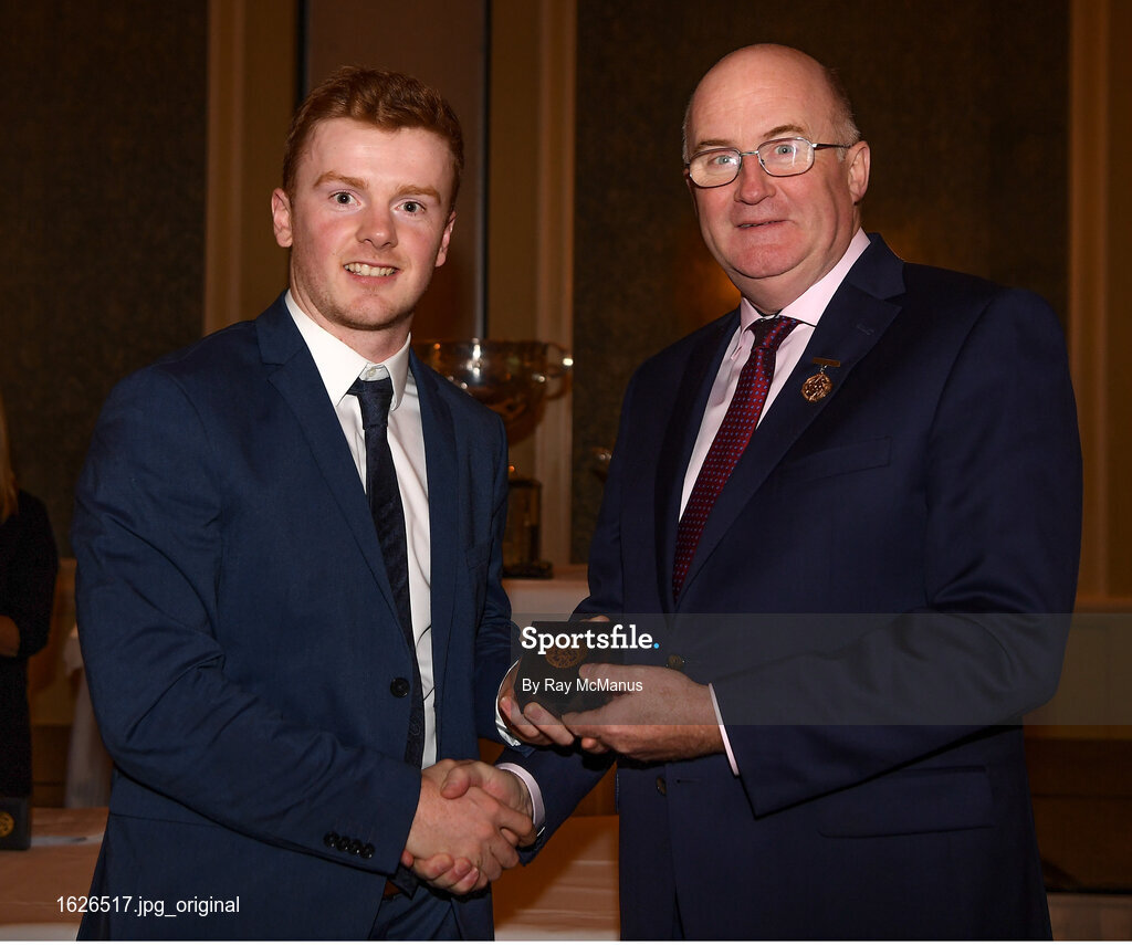 22 December 2018; Colm McHugh of Dublin is presented with his GAA Football All-Ireland Senior Championship medal by Uachtarán Chumann Lúthchleas Gael John Horan at the InterContinental Dublin, Simmonscourt Road, Ballsbridge, Dublin Photo by Ray McManus/Sportsfile