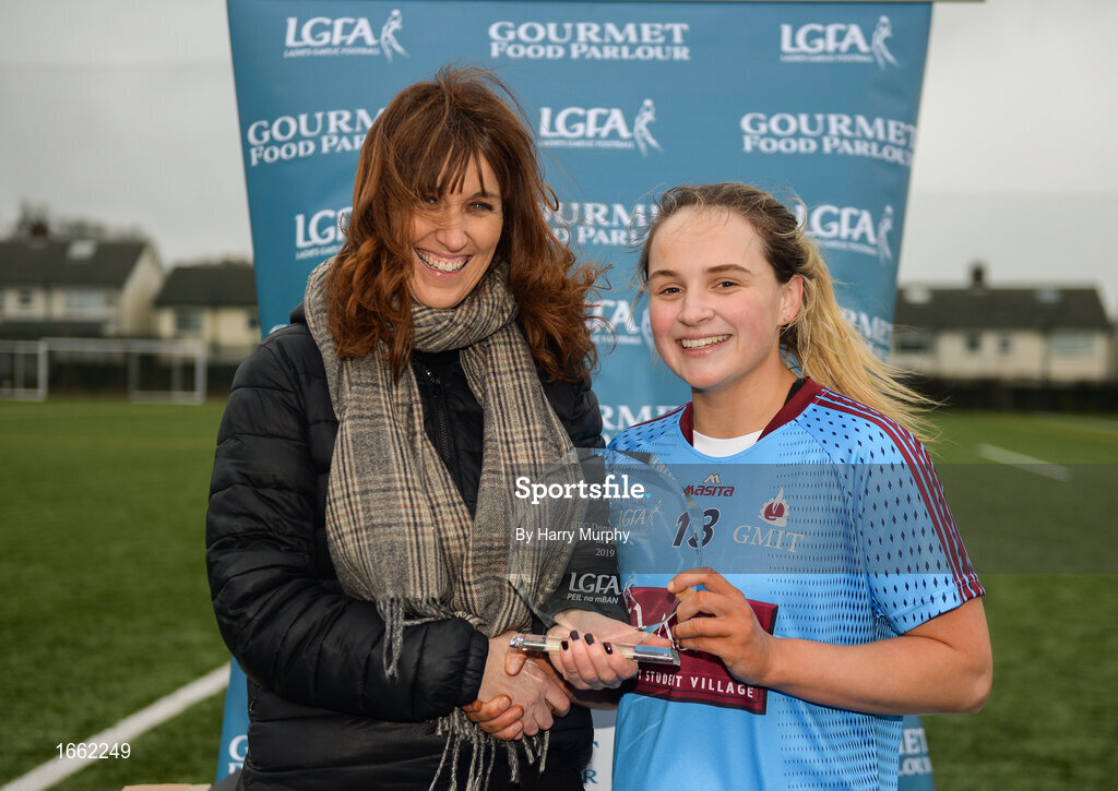 8 March 2019; Andrea Trill of NUIG is presented the player of the match award by Marketing Communications Manager for Gourmet Food Parlour Shirley Byrne following the Gourmet Food Parlour Donaghy Cup Final match between Galway Mayo Institute of Technology and Marino at TU Dublin Broombridge Sports Grounds in Dublin. Photo by Harry Murphy/Sportsfile