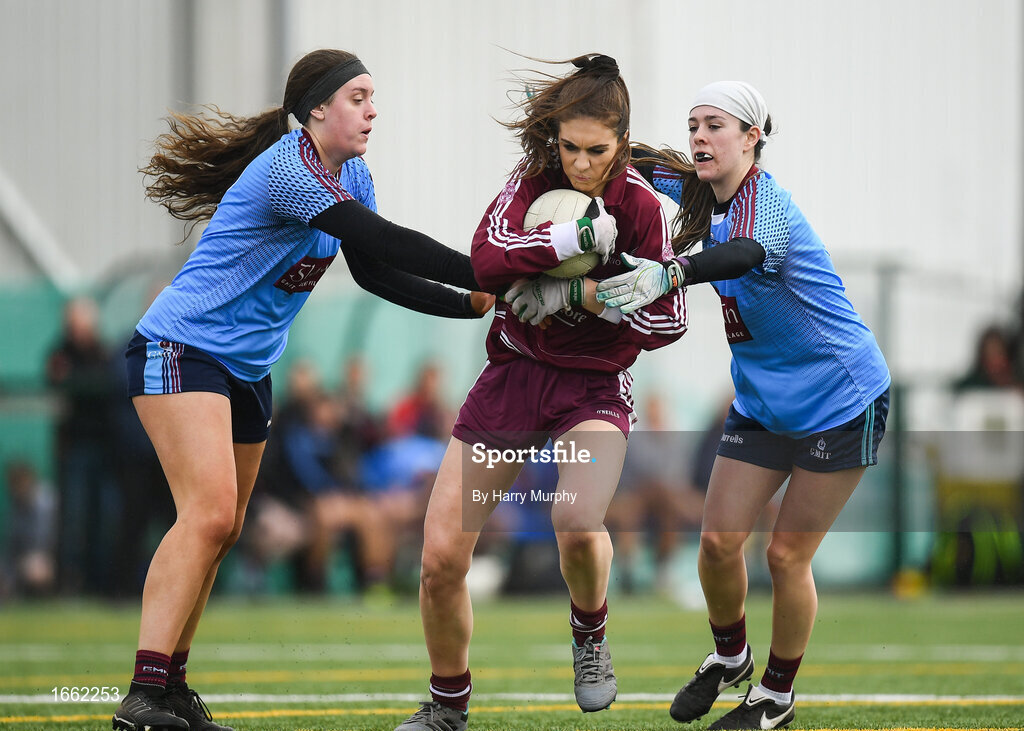 8 March 2019; Eilish O'Dowd of Marino in action against Isobel Flynn, left, and Shauna Hynes of NUIG during the Gourmet Food Parlour Donaghy Cup Final match between Galway Mayo Institute of Technology and Marino at TU Dublin Broombridge Sports Grounds in Dublin. Photo by Harry Murphy/Sportsfile
