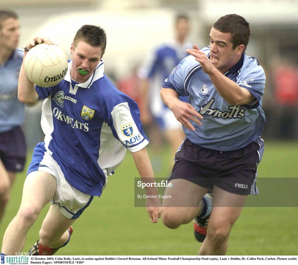 12 October 2003; Colm Kelly, Laois, in action against Dublin's Gerard Brennan. All-Ireland Minor Football Championship Final replay, Laois v Dublin, Dr. Cullen Park, Carlow. Picture credit; Damien Eagers / SPORTSFILE *EDI*