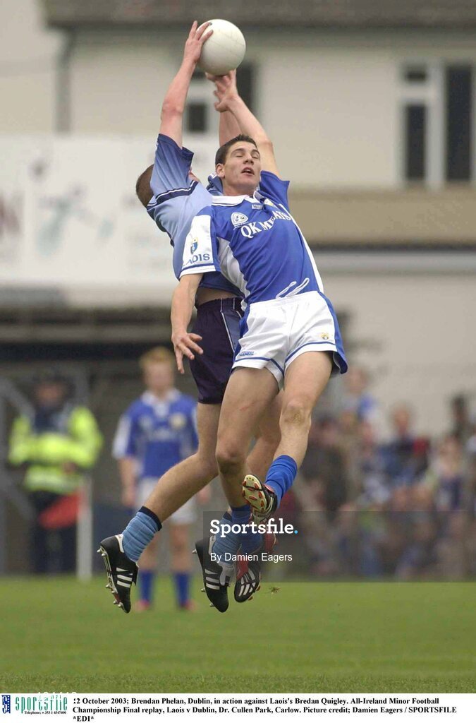 12 October 2003; Brendan Phelan, Dublin, in action against Laois' Brendan Quigley. All-Ireland Minor Football Championship Final replay, Laois v Dublin, Dr. Cullen Park, Carlow. Picture credit; Damien Eagers / SPORTSFILE *EDI*