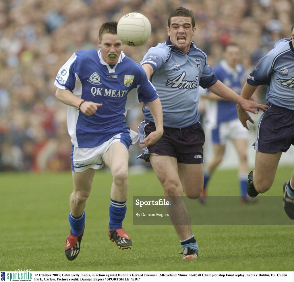 12 October 2003; Colm Kelly, Laois, in action against Dublin's Gerard Brennan. All-Ireland Minor Football Championship Final replay, Laois v Dublin, Dr. Cullen Park, Carlow. Picture credit; Damien Eagers / SPORTSFILE *EDI*