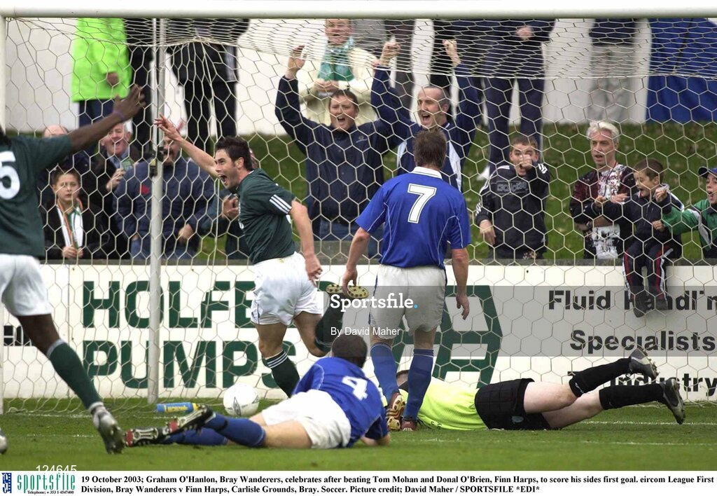 19 October 2003; Graham O'Hanlon, Bray Wanderers, celebrates after beating Tom Mohan and Donal O'Brien, Finn Harps, to score his sides first goal. eircom League First Division, Bray Wanderers v Finn Harps, Carlisle Grounds, Bray. Soccer. Picture credit; David Maher / SPORTSFILE *EDI*