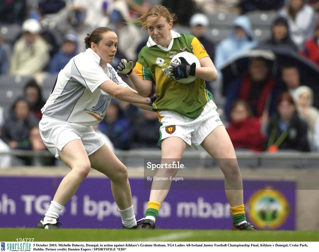 5 October 2003; Michelle Doherty, Donegal, in action against Kildare's Grainne Heduan. TG4 Ladies All-Ireland Junior Football Championship Final, Kildare v Donegal, Croke Park, Dublin. Picture credit; Damien Eagers / SPORTSFILE *EDI*