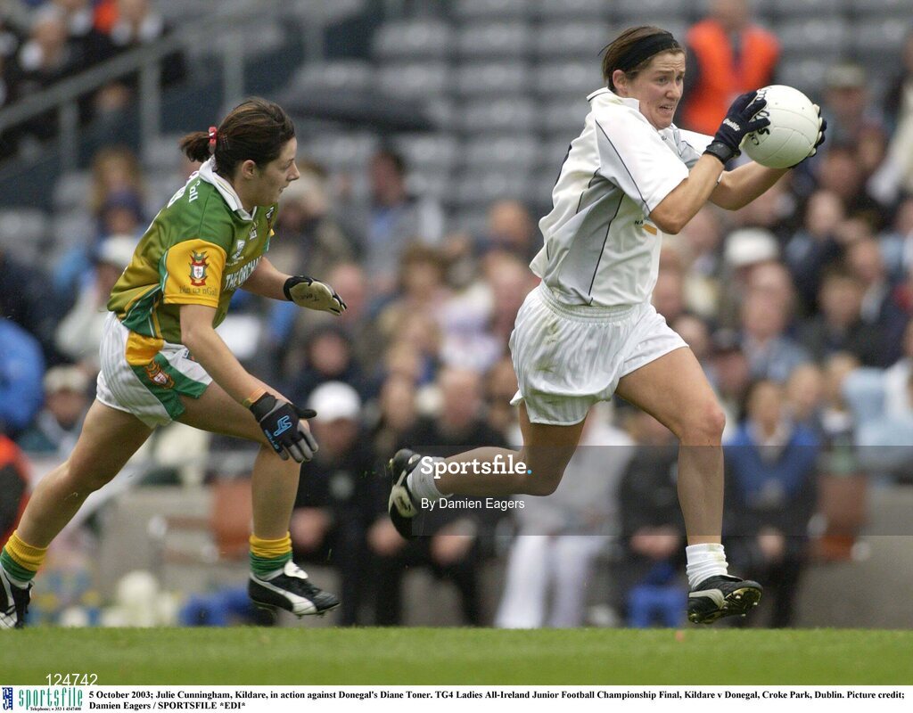 5 October 2003; Julie Cunningham, Kildare, in action against Donegal's Diane Toner. TG4 Ladies All-Ireland Junior Football Championship Final, Kildare v Donegal, Croke Park, Dublin. Picture credit; Damien Eagers / SPORTSFILE *EDI*