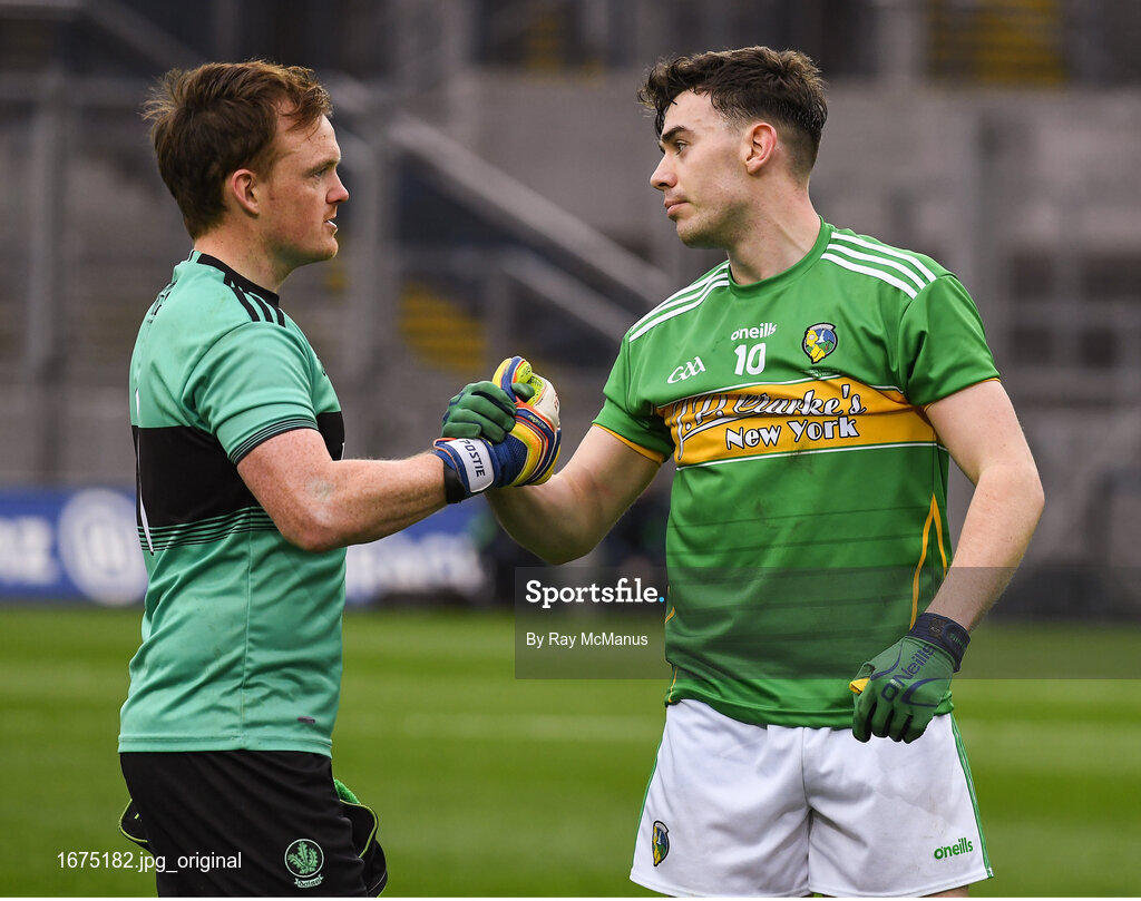 30 March 2019; Dean McGovern of Leitrim is consouled by goalkeeper Thomas Mallon of Derry after the Allianz Football League Division 4 Final between Derry and Leitrim at Croke Park in Dublin. Photo by Ray McManus/Sportsfile