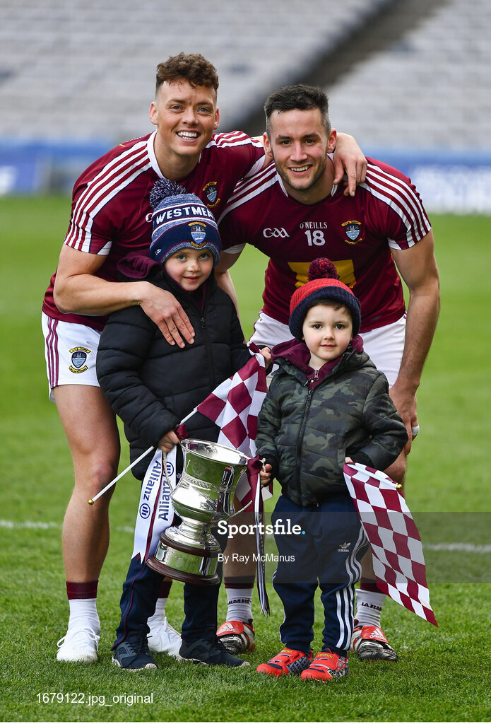6 April 2019; Tommy McDaniel, left, and Noel Mulligan of Westmeath with five year old Tom and three year old Conor Adamson, from Moat, celebrate after the Allianz Football League Division 3 Final match between Laois and Westmeath at Croke Park in Dublin. Photo by Ray McManus/Sportsfile